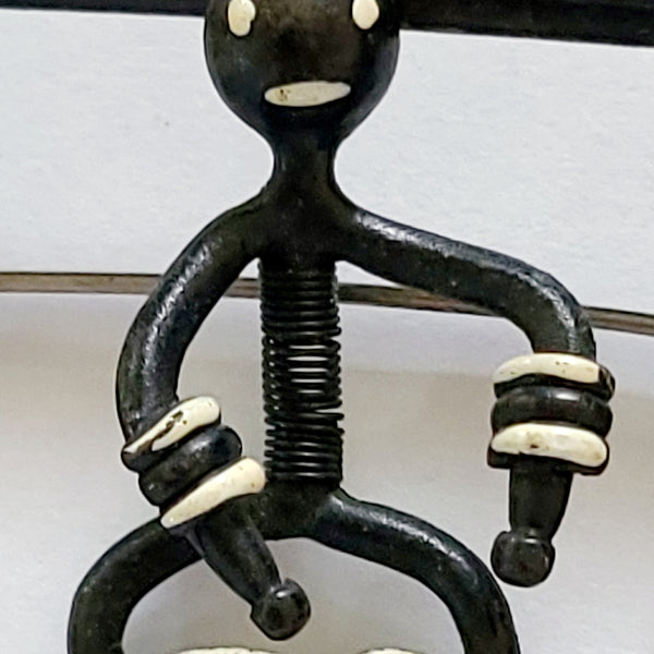 Black Enameled Bongo Drummer Trembler Brooch