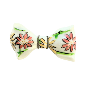 White Plastic Bow Pin with Enameled Flowers