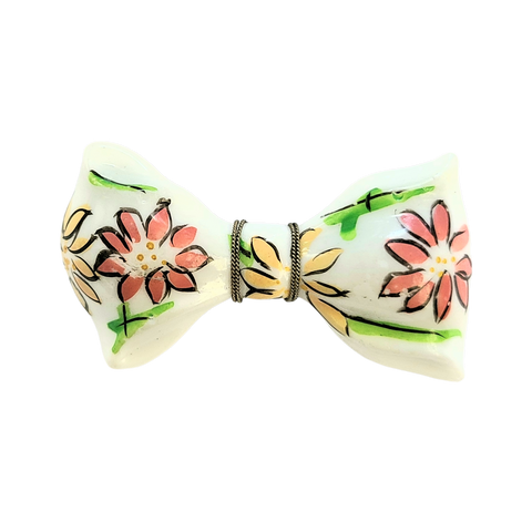 White Plastic Bow Pin with Enameled Flowers